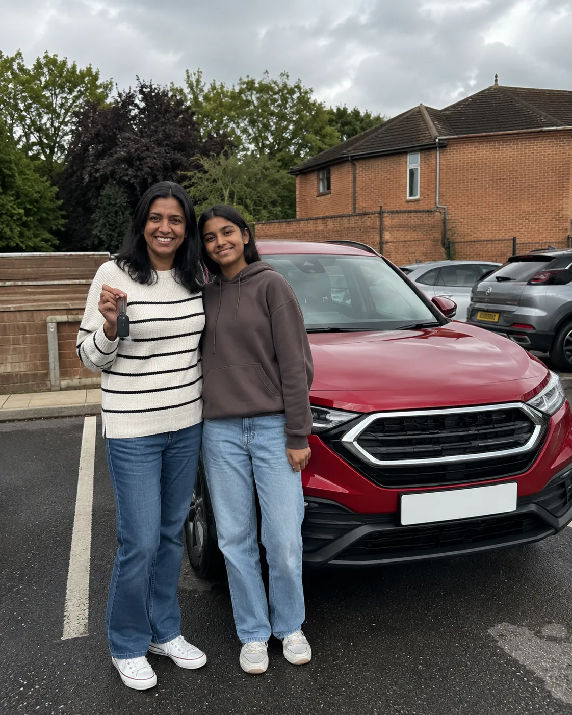 Happy Hilton Garage customer with their car